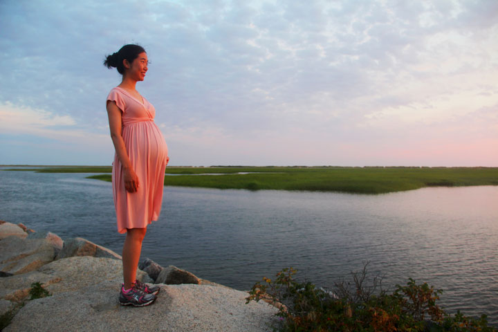 Provincetown West End, Breakwater... Jiang watching sunset; photograph by Ewa Nogiec